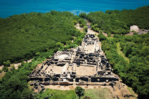 Photo courtesy of National Geographic. Overview of the Kilwa ruins showcasing the vast ruins of the port city. 