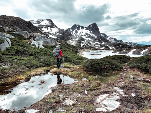 backpacker enjoys the views of remote Patagonia world tourism day