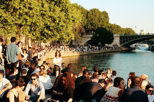 Mass of tourists along the Seine river in Paris