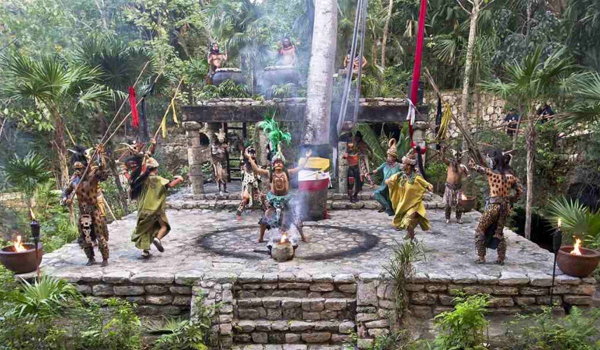 A representation of an ancient Maya ritual in the Xcaret Park that shows the involvement of indigenous people in the tourism program but can also be considered cultural appropriation. 